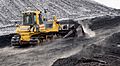 Komatsu bulldozer pushing coal in Power plant Ljubljana (winter 2017)