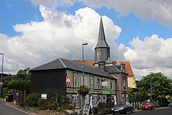Église Coquainvilliers et maison augeronne.jpg