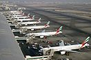 Emirates Boeing 777 fleet at Dubai International Airport Wedelstaedt.jpg