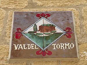 Archivo:Grafía con emblema del municipio de Valdeltormo (Teruel)