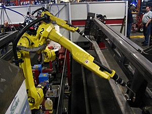 Archivo:FANUC 6-axis welding robots