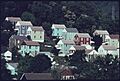 HOUSE OF BOOMER SEEN FROM ACROSS KANAWHA RIVER. THEY ARE LOCATED NEAR THE UNION CARBIDE FERRO-ALLOY PLANT. TOTAL... - NARA - 557405