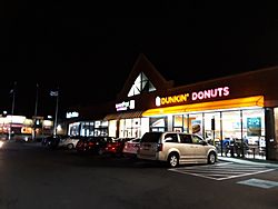 Greenbriar Shopping Center Dunkin' Donuts at night, lighter version.jpg