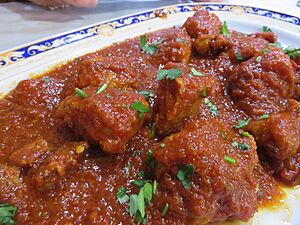 Archivo:Magro de cerdo con tomate