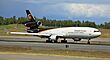 UPS MD-11 on its takeoff roll at ANC (5972485750).jpg