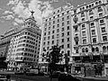 A Black and white photograph of building at Gran Via, Madrid Spain 033