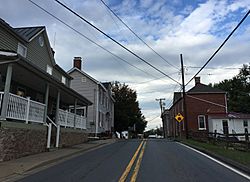 2016-10-13 10 10 35 View west along Maryland State Route 107 (Fisher Avenue) at Norris Road in Poolesville, Montgomery County, Maryland.jpg