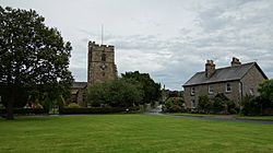 Natland village green and St Mark's church.jpg