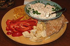 Chunky clam dip with various dipping foods.jpg