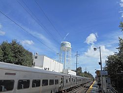 Carle Place LIRR Station and Water Tower.jpg