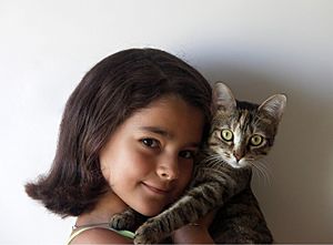 Archivo:Girl and cat