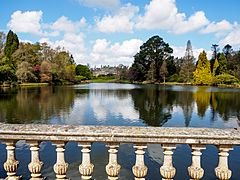 Sheffield Park House from the Top Bridge in Sheffield Park Gardens-26797406902