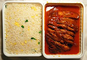 Archivo:Babi panggang speciaal met nasi