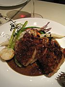 Truffes, côtes de porc et bacon grillés