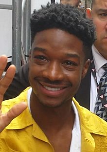 Lamar Johnson - Close-up Waving - TIFF (43917080104) (cropped).jpg