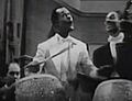 Cee Pee Johnson (with unidentified musicians), performing his composition, "Beat My Blues Away," in Mystery in Swing (1940)
