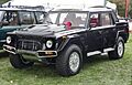 1990 Lamborghini LM American in Black, front left (Greenwich 2021)