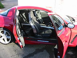 Archivo:Mazda rx-8 side both doors open