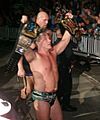 Jericho with the tag titles