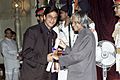 The renowned actor Shri Shah Rukh Khan receives the Padma Shri award from the President Dr. A.P.J. Abdul Kalam in New Delhi on March 28, 2005