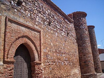Iglesia Parroquial de San Juan Bautista y Santo Domingo de Silos. Puerta Sur y Torreones