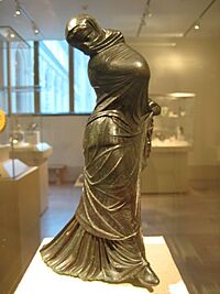 Archivo:Bronze Statuette of a Veiled and Masked Dancer 1