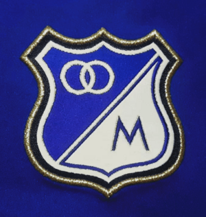 Archivo:Escudo indumentaria Millonarios 2012