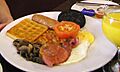 Cooked breakfast with potato waffle