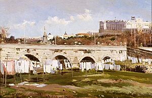 Archivo:José Lupiáñez-Lavaderos junto Puente Segovia de Madrid-1900