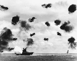 USS Yorktown (CV-5) is hit by a torpedo on 4 June 1942.jpg