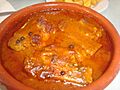 Manitas de cerdo con salsa