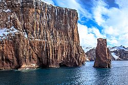 Archivo:Excursion No. 12. into the old caldera of Deception Island.passing through Neptunes Bellows on the way to Port Foster, the old whaling station from the early 1900's. (25715031500)