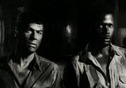 Archivo:Tony Curtis-Sidney Poitier in The Defiant Ones trailer