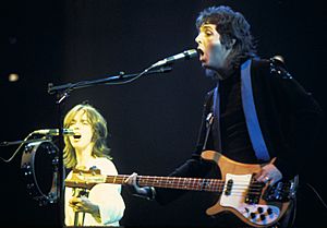 Paul McCartney with Jimmy McCulloch - Wings - 1976.jpg