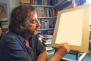 Armin Peter Faust trabajando en un dibujo donde el propio artista está representado.