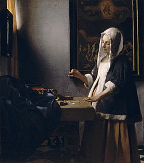 Woman Holding a Balance (Vermeer)