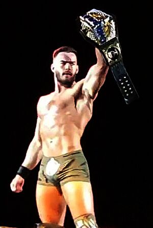Archivo:Austin Theory - WWE Live Birmingham April 2023 (cropped)