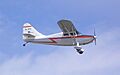 Stinson 108-3 Voyager flying.jpg
