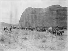 An overland caravan laden with boats. Robert B. Stanton's Denver, Colorado Canyon, and Pacific Railway Survey, 1889-90 - NARA - 518033