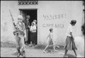 Food distribution in front of "Yankees come back" sign, Santo Domingo, May 9., 1965 - NARA - 541807