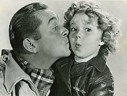 Archivo:James Dunn and Shirley Temple publicity photo for "Bright Eyes" - front (cropped)
