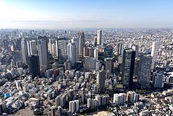 US Air Force photo 170903-F-PM645-1558 An aerial view of Shinjuku’s skyscraper district from a UH-1N Iroquois.jpg
