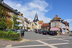 Looking up Place du Colonel Langlois towards the Saint-Sauveur church, Beaumont-en-Auge, 2024.jpg