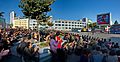 0921 - Nordkorea 2015 - Pjöngjang - Public Viewing am Bahnhofsplatz (22584958809)
