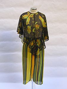 1972 green, black and gold "Insects" dress by Yannis Tseklenis