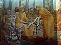 Buddhaghosa with three copies of Visuddhimagga