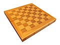 Empty wooden chessboard