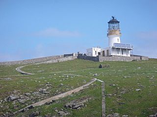 Flannan Isles- the lighthouse from the sea to the south (geograph 3201899).jpg