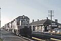 Chicago and Eastern Illinois 265 (GP35) passing the Steger, IL Depot on November 26, 1965 (27482523861)