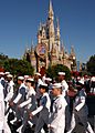 Sailors from various U.S. Navy commands throughout Navy's Southeast Region march before Cinderella's Castle before entering onto Main St. inside Walt Disney World's Magic Kingdom 2